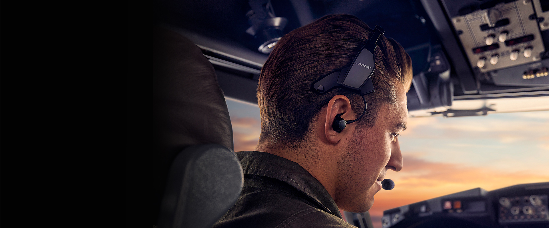 Pilot in the cockpit wearing Bose A30 Headset