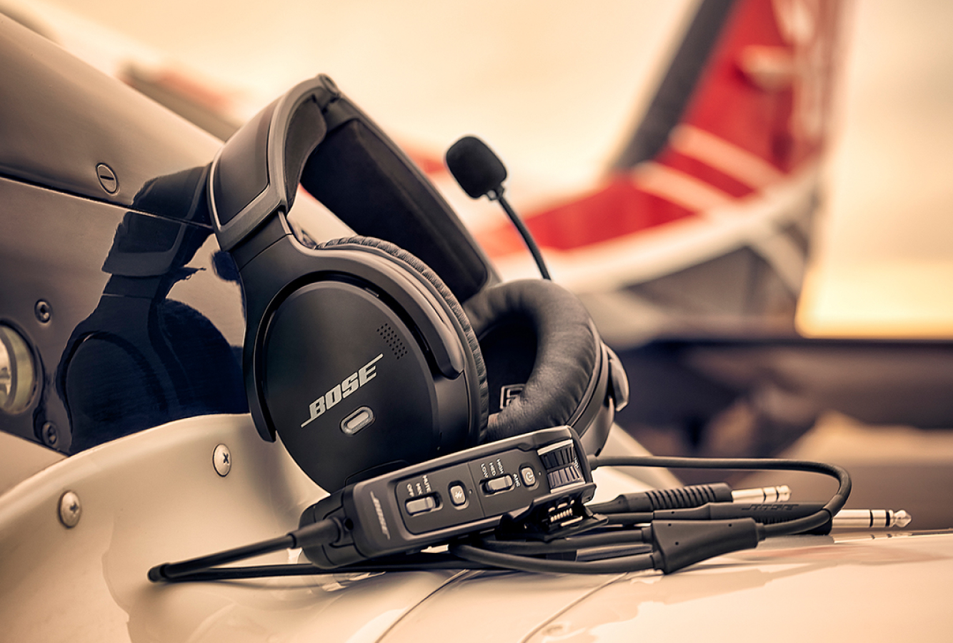 Bose Aviation A30 Headset on the wing of a Baron plane